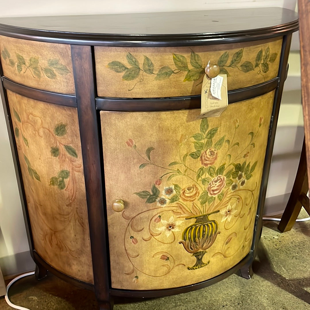 Demilune cabinet with flower