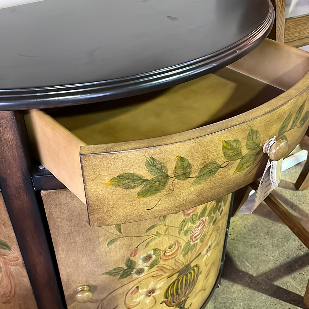 Demilune cabinet with flower