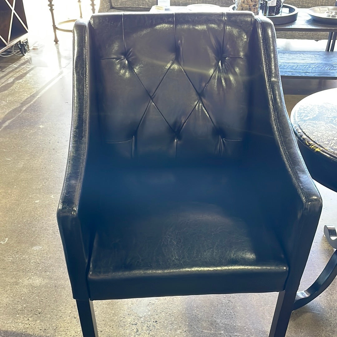 Pair black tuffed chairs