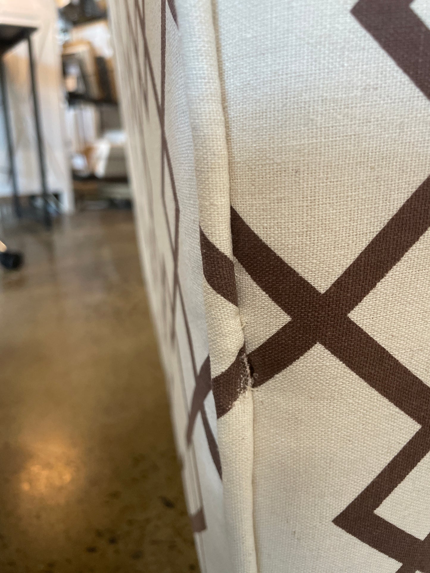 Cream accent chair with geo pattern