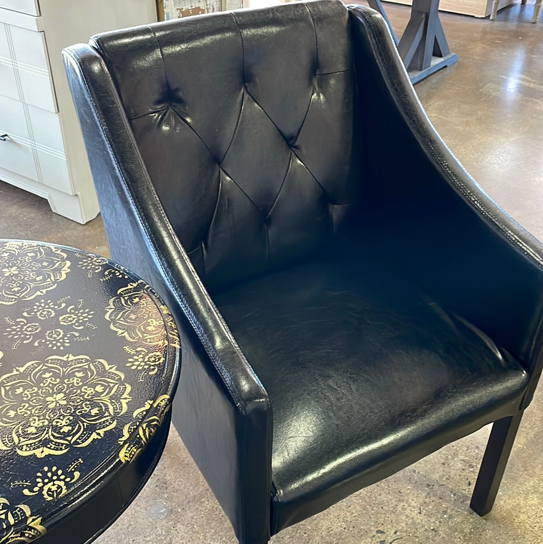 Pair black tuffed chairs