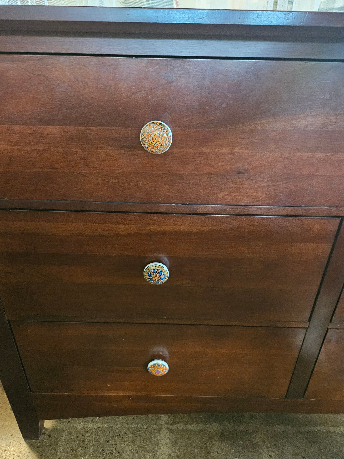 Kincaid 9 drawer dresser with colorful knobs