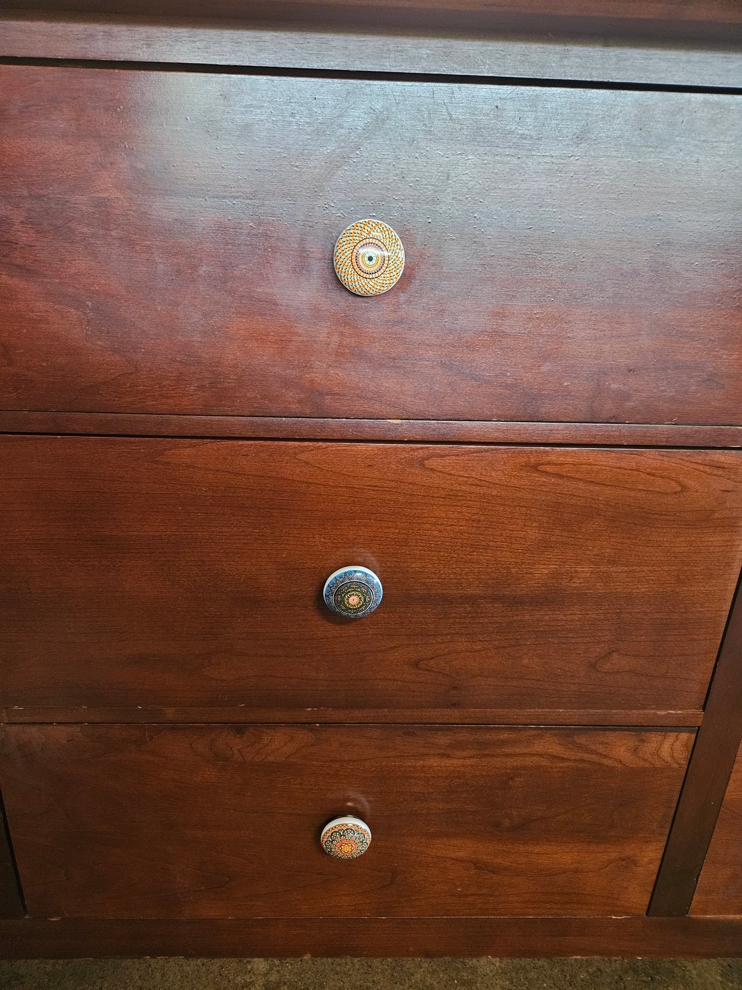 Kincaid 9 drawer dresser with colorful knobs