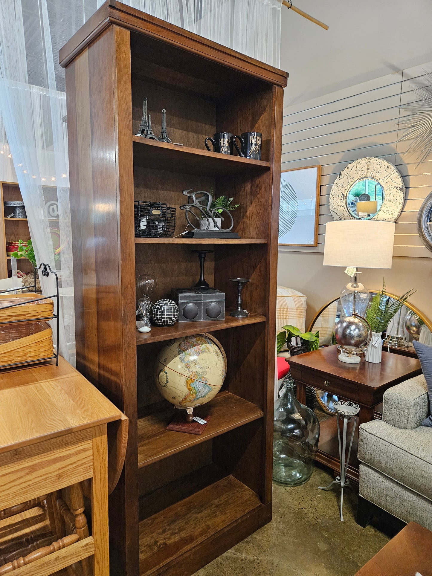Tall dark wood bookshelf