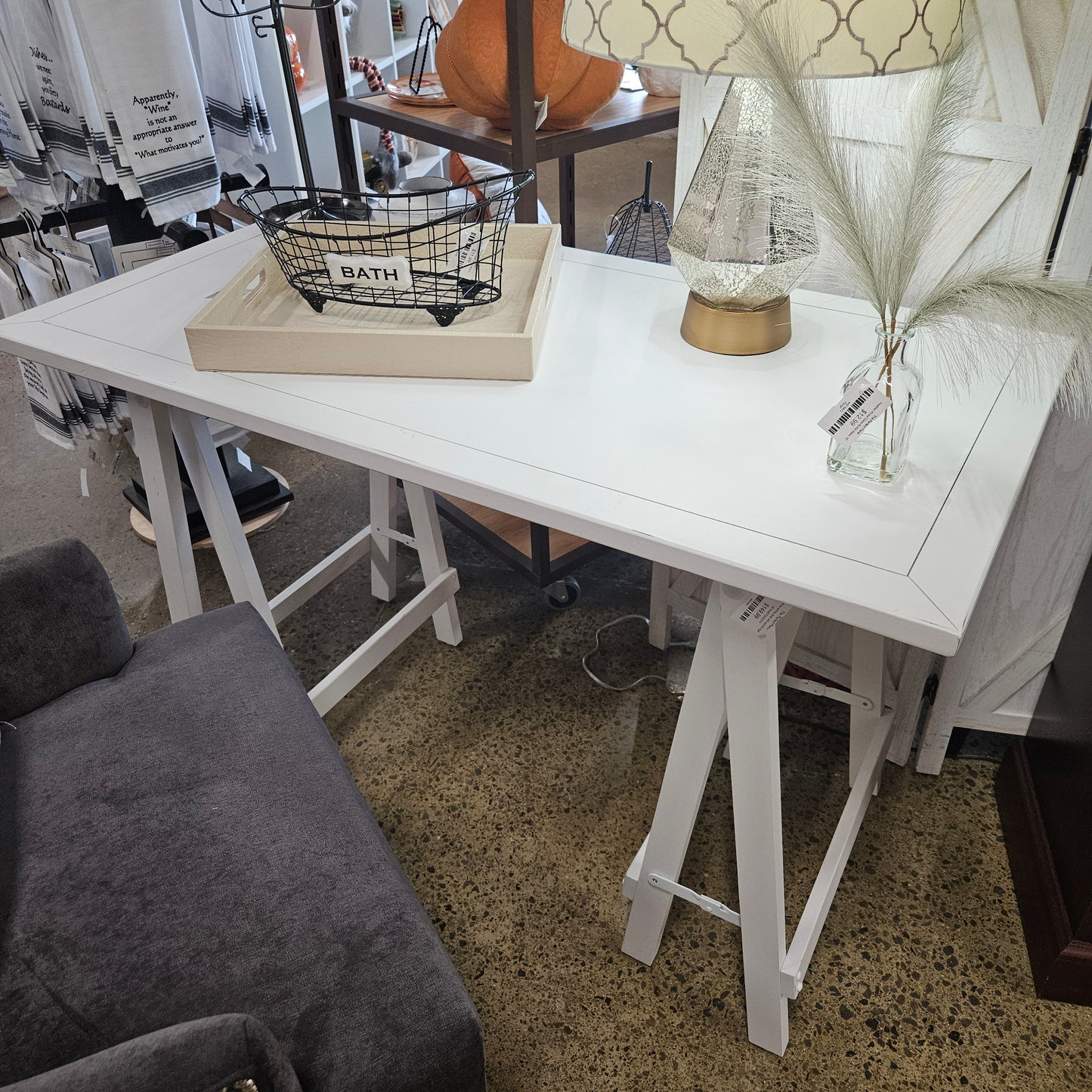 White writing desk with saddle legs
