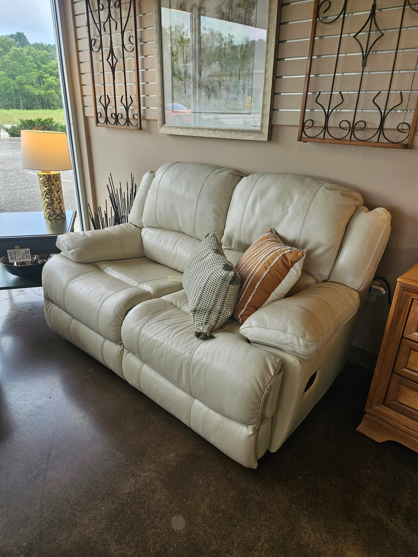 Cream Bonded Leather Reclining Loveseat