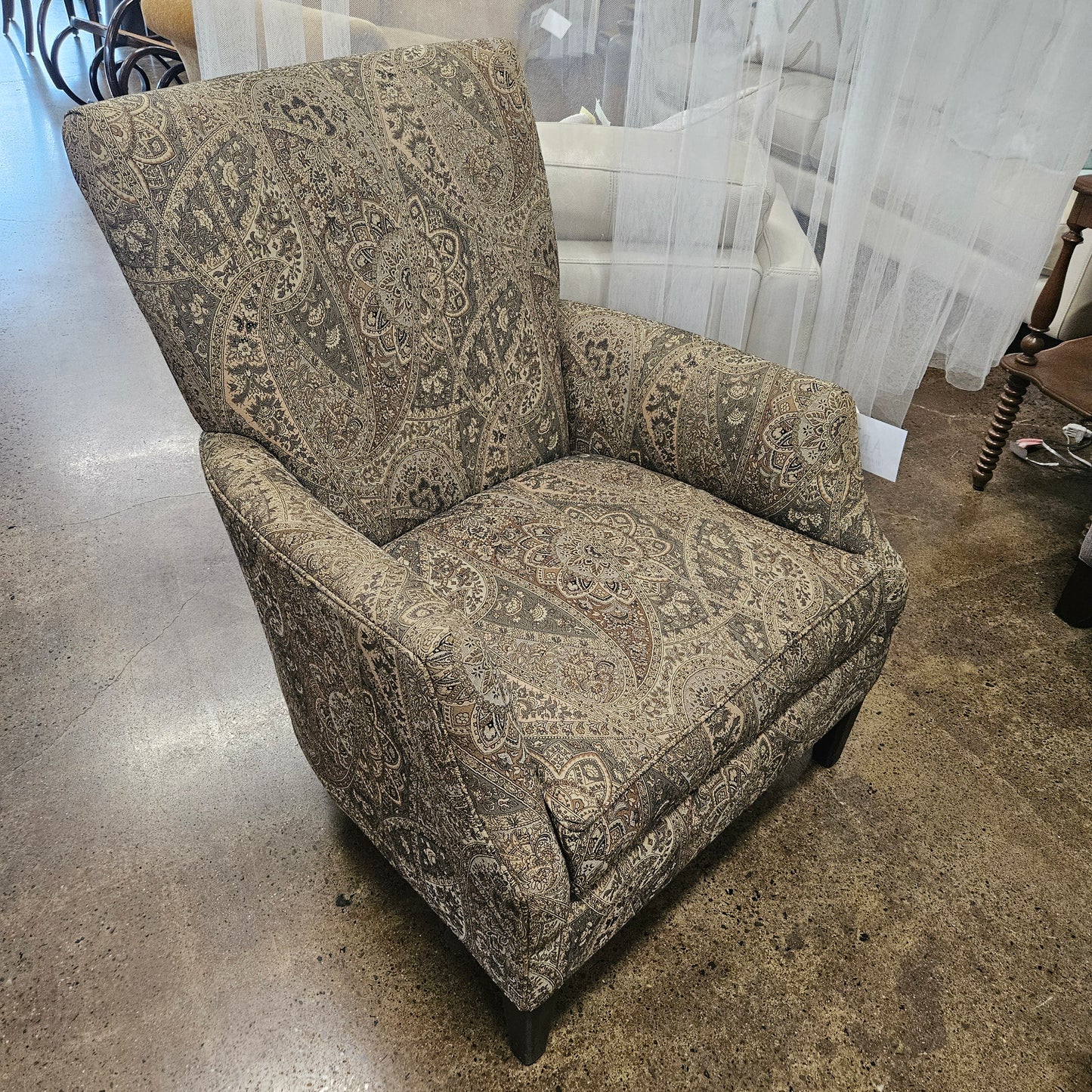Cream and Taupe upholstered chair by Arhaus