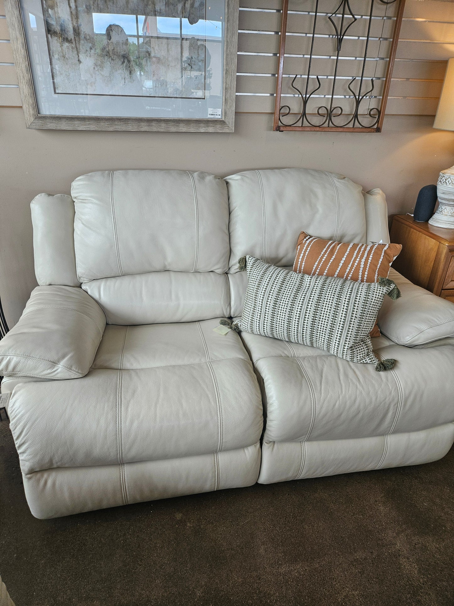 Cream Bonded Leather Reclining Loveseat