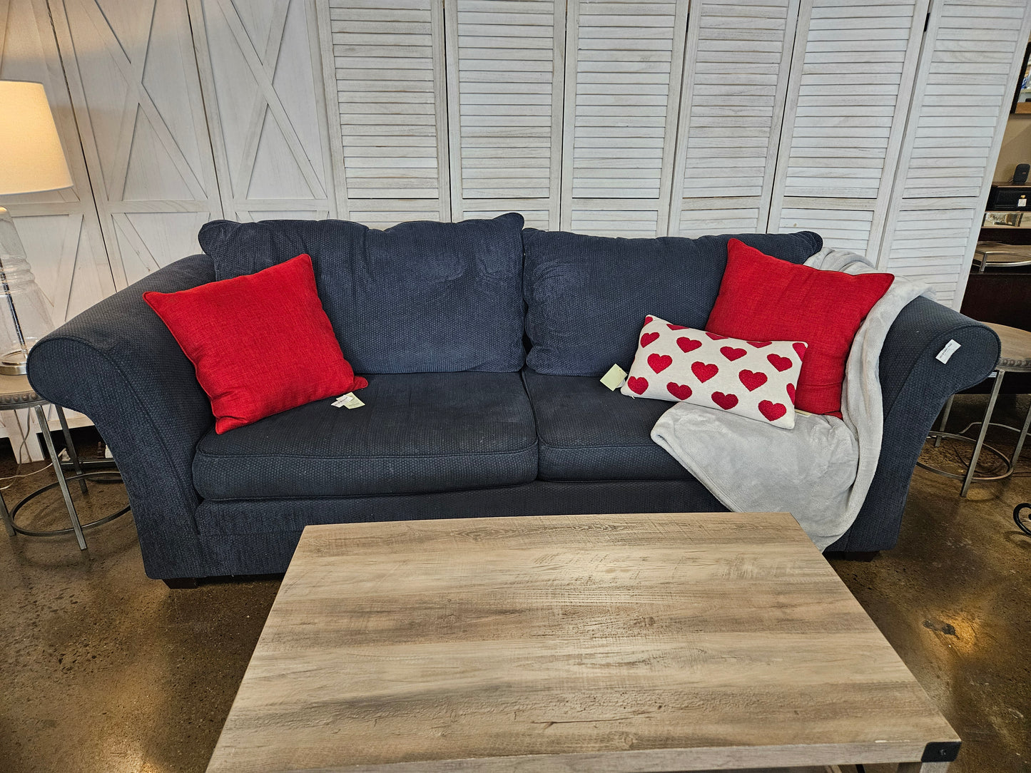 Blue sofa with detachable cushions