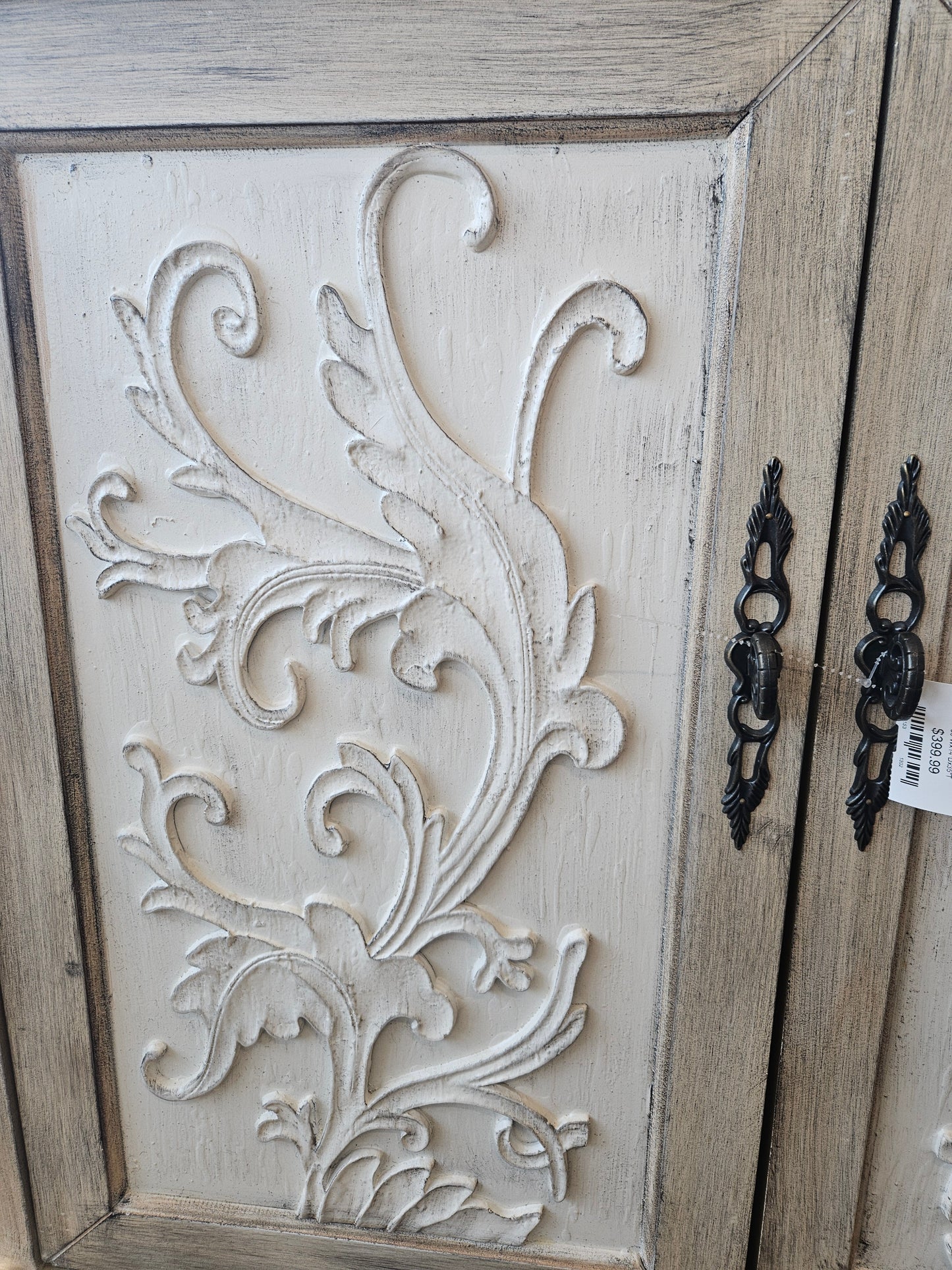 Wood carved accent cabinet