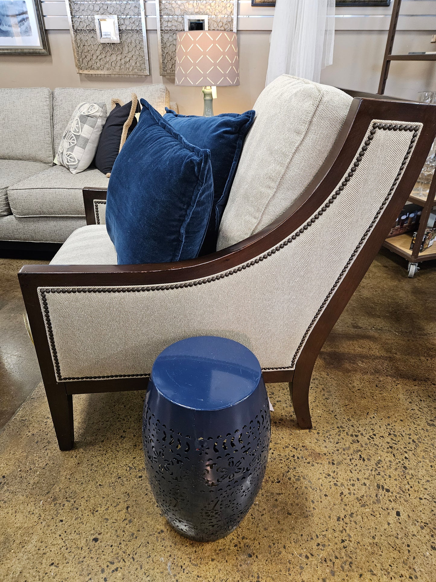 Cream fabric with distressed wood chair