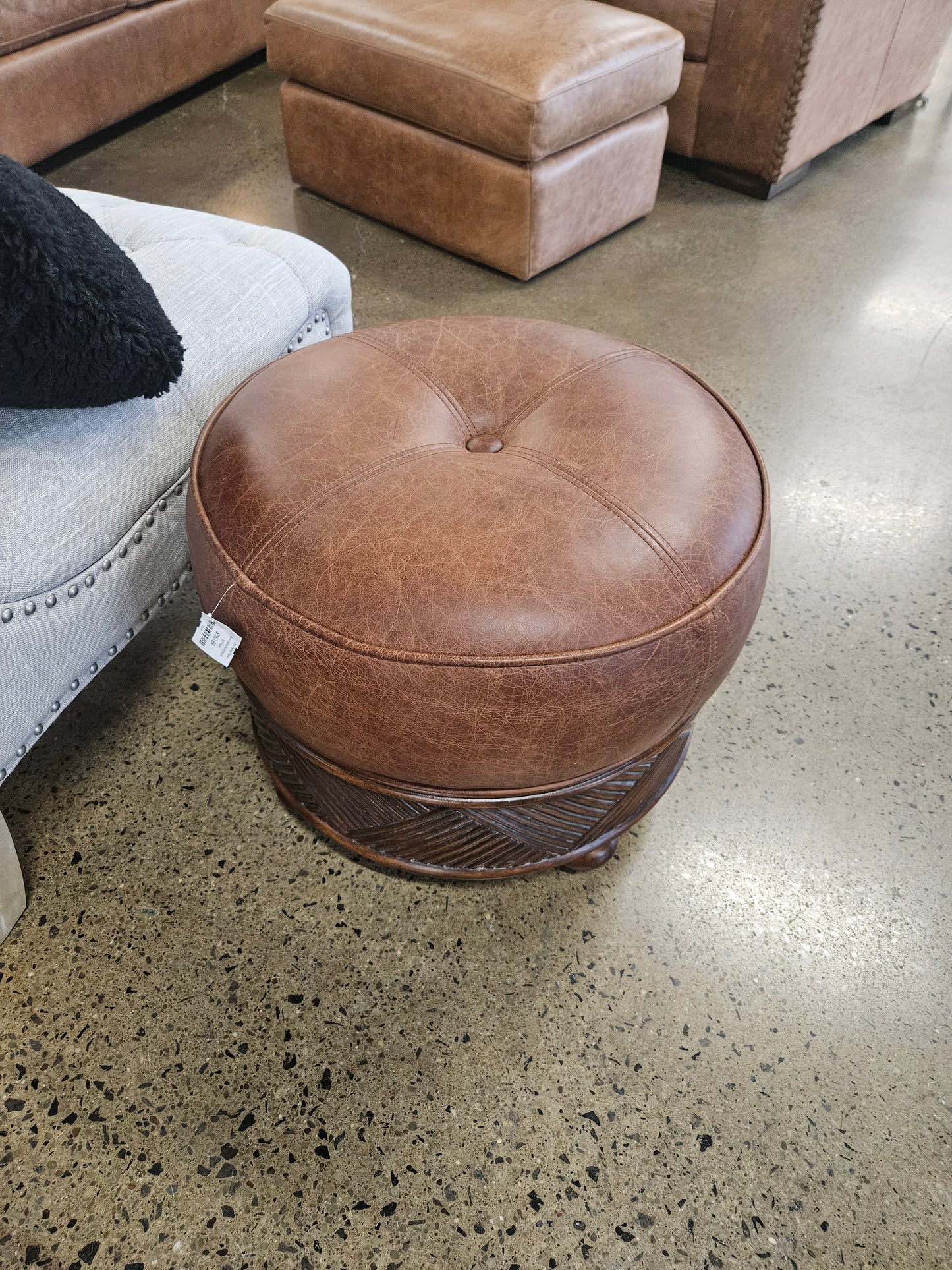 Brown leather/wood ottoman