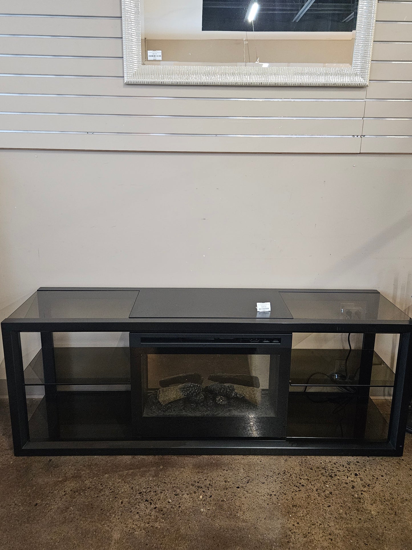 Black media stand with fireplace insert
