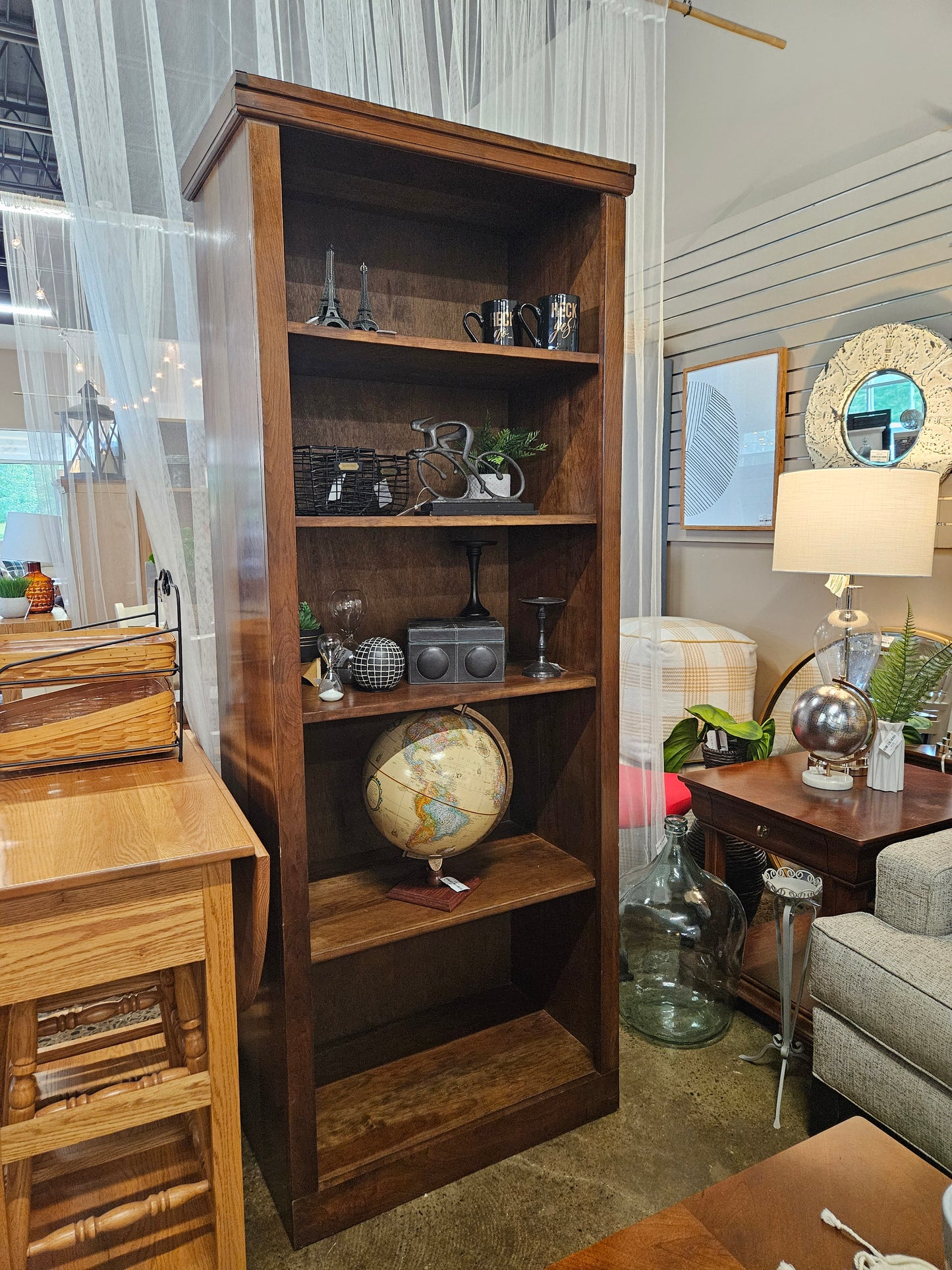 Tall dark wood bookshelf