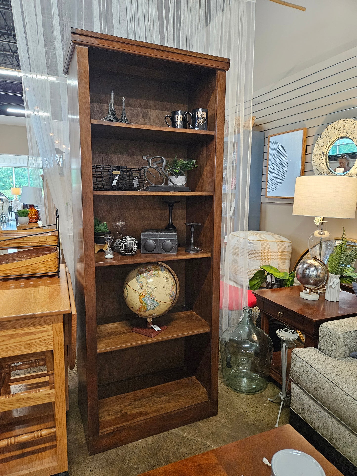 Tall dark wood bookshelf