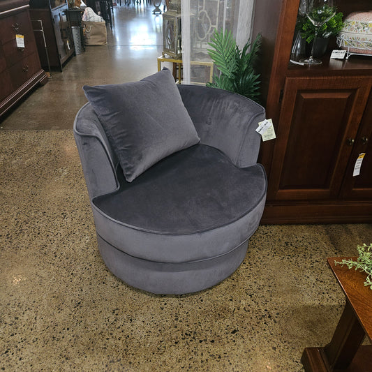 Gray velvet swivel chair