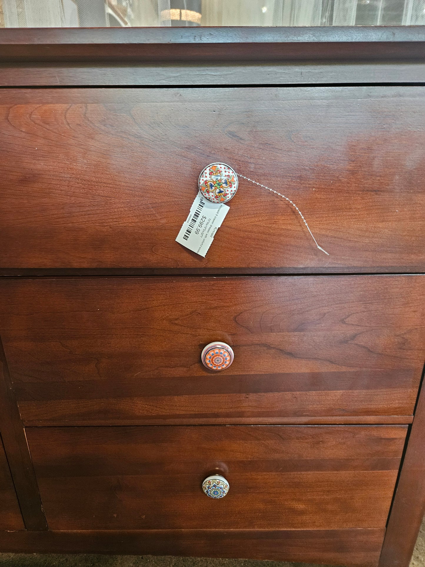 Kincaid 9 drawer dresser with colorful knobs