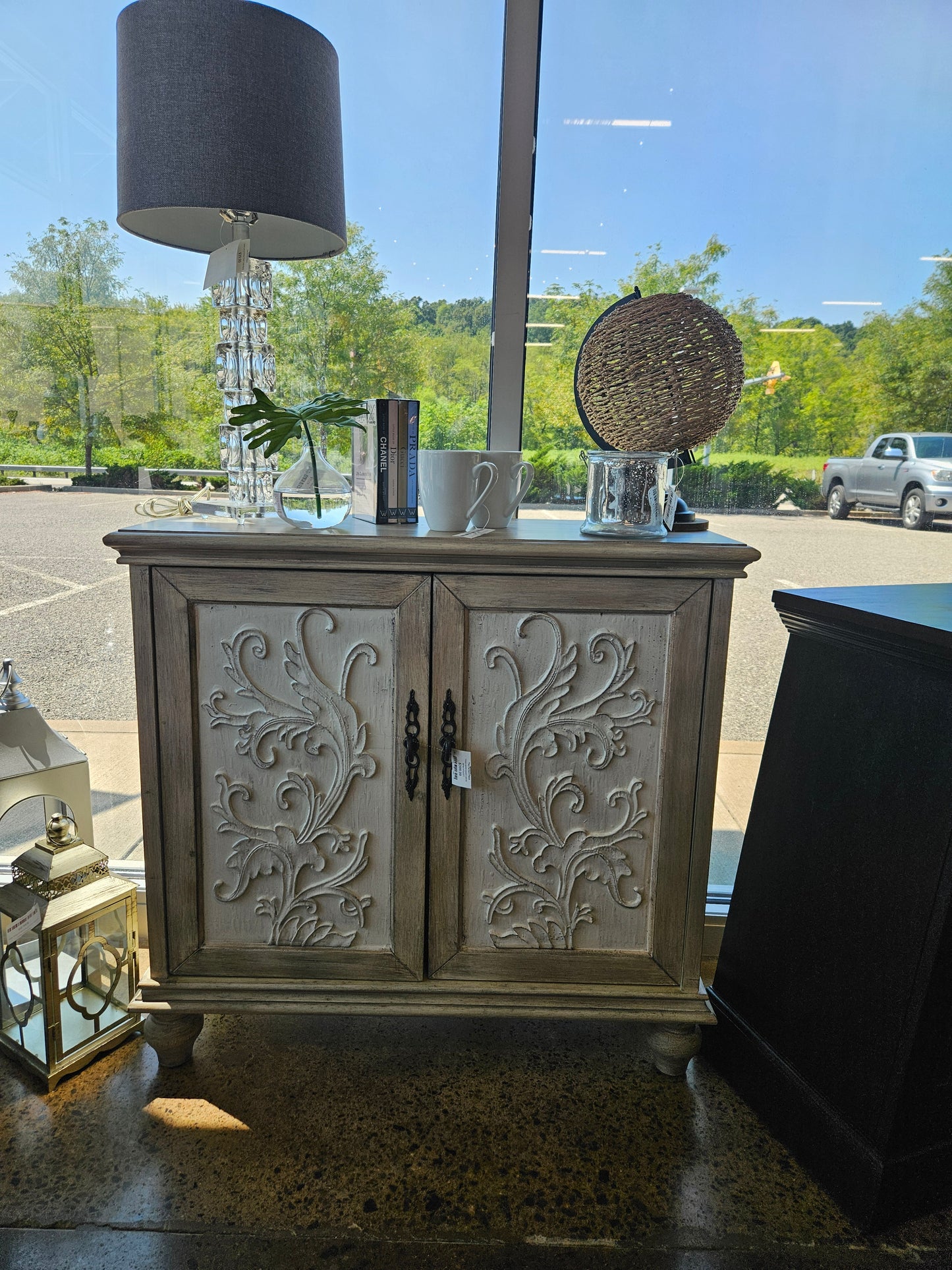 Wood carved accent cabinet