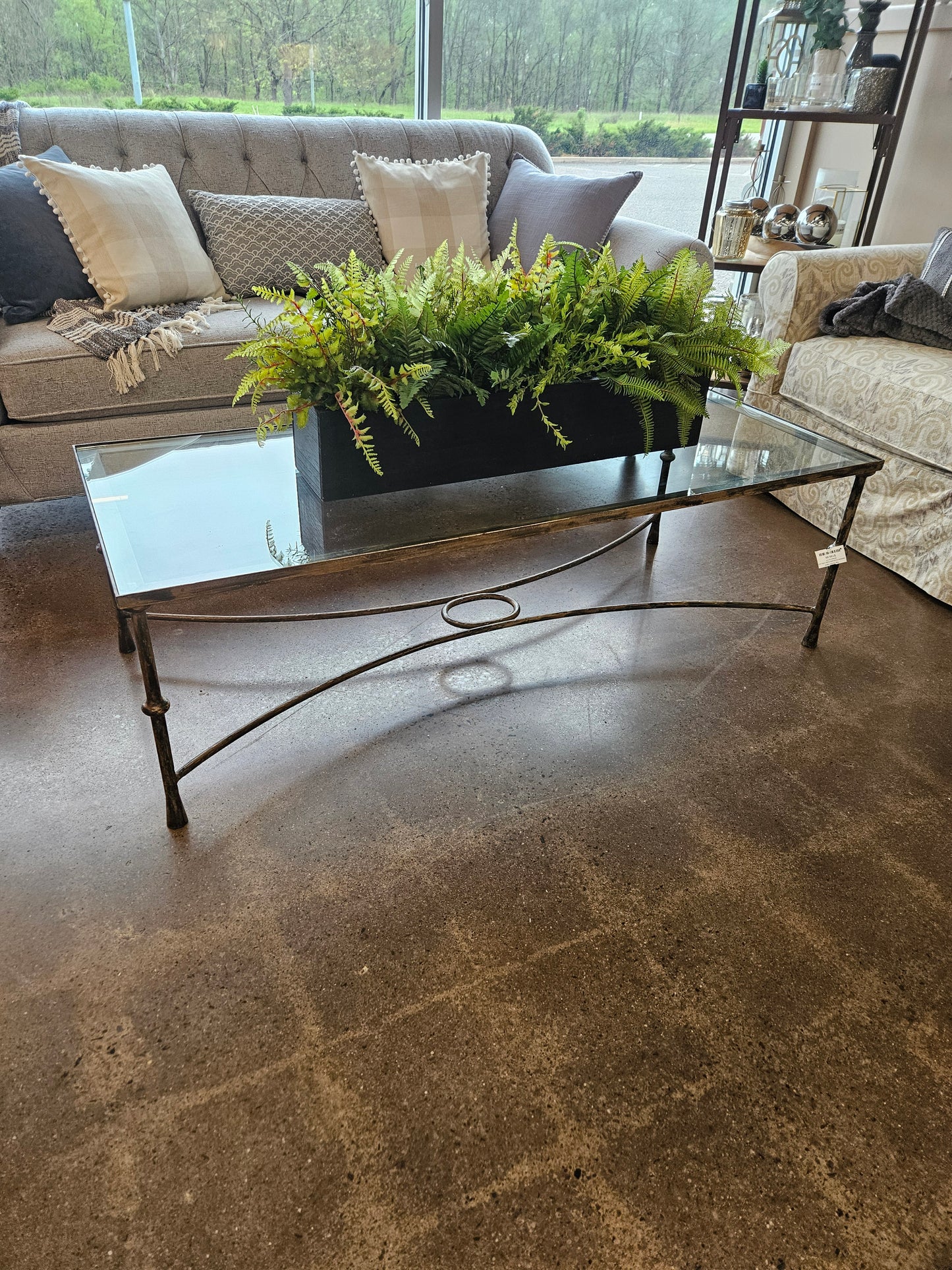 Hammered bronze glass topped coffee table