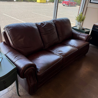 Brown leather reclining sofa