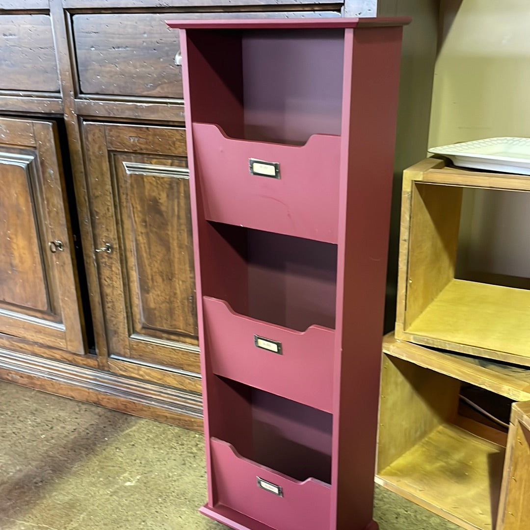 Red organizer, floor sitting