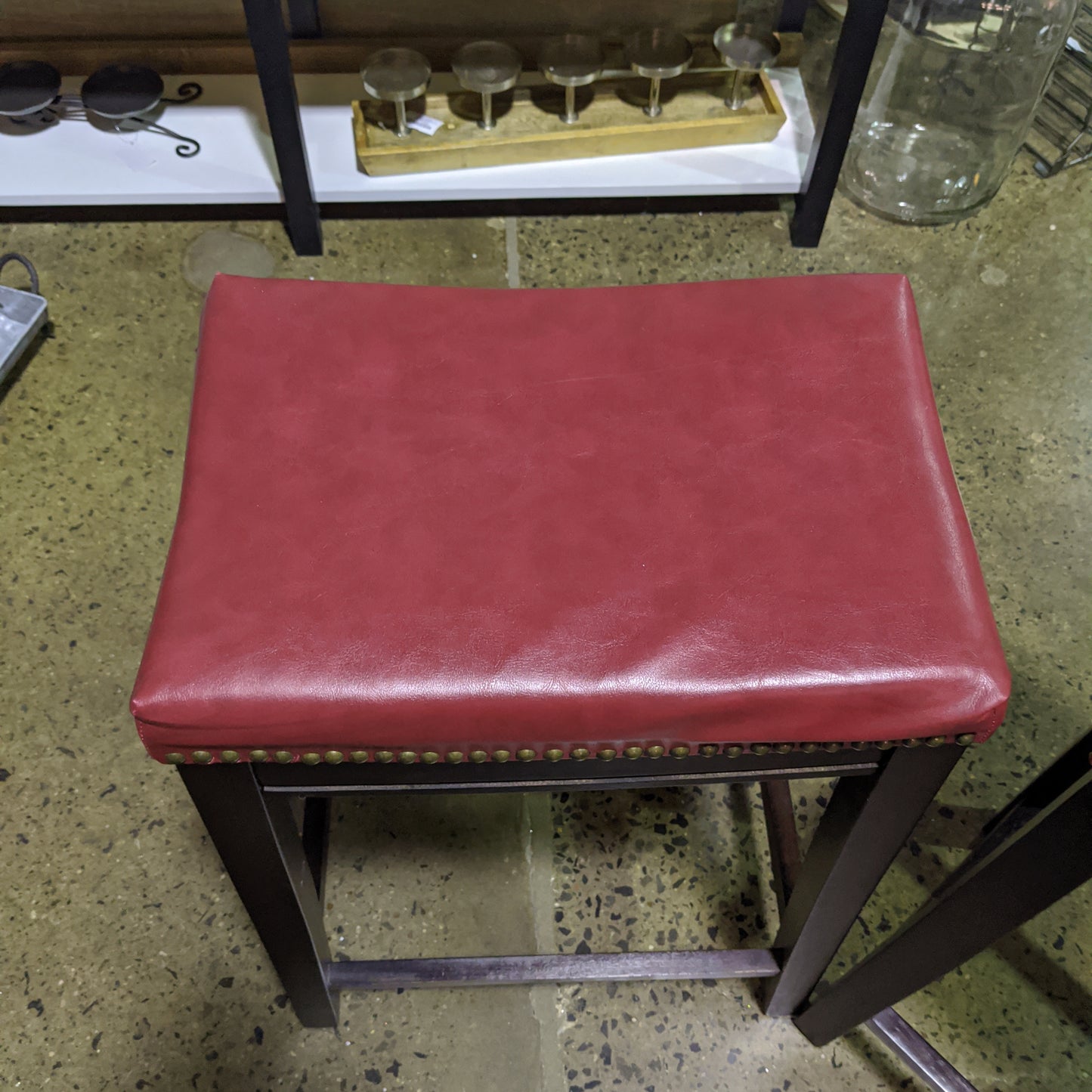 Red leather like set of counter height stools