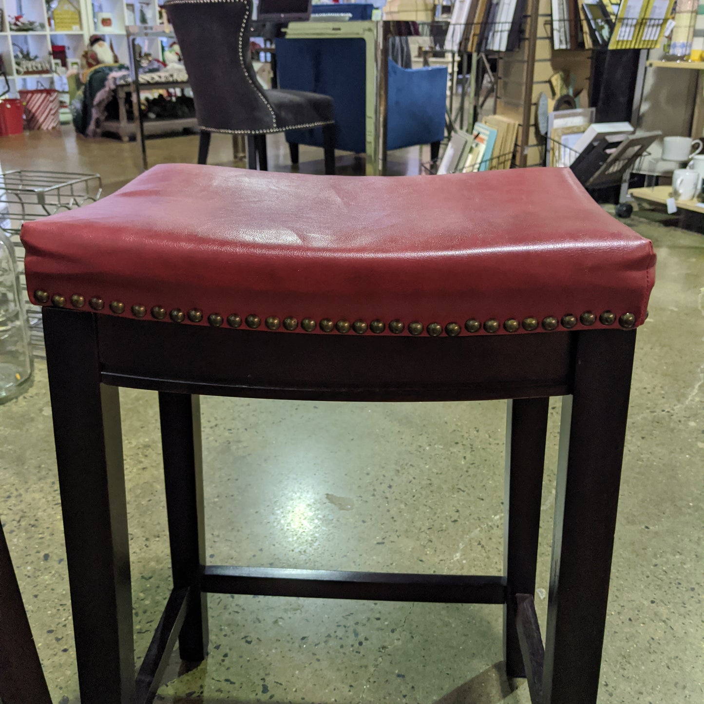 Red leather like set of counter height stools