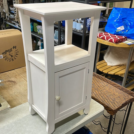 White cabinet with shelf and door