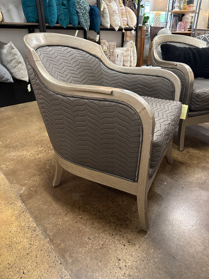 Taupe upholstered barrel chair