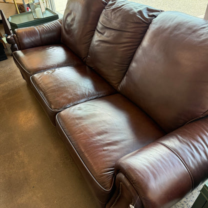 Brown leather reclining sofa