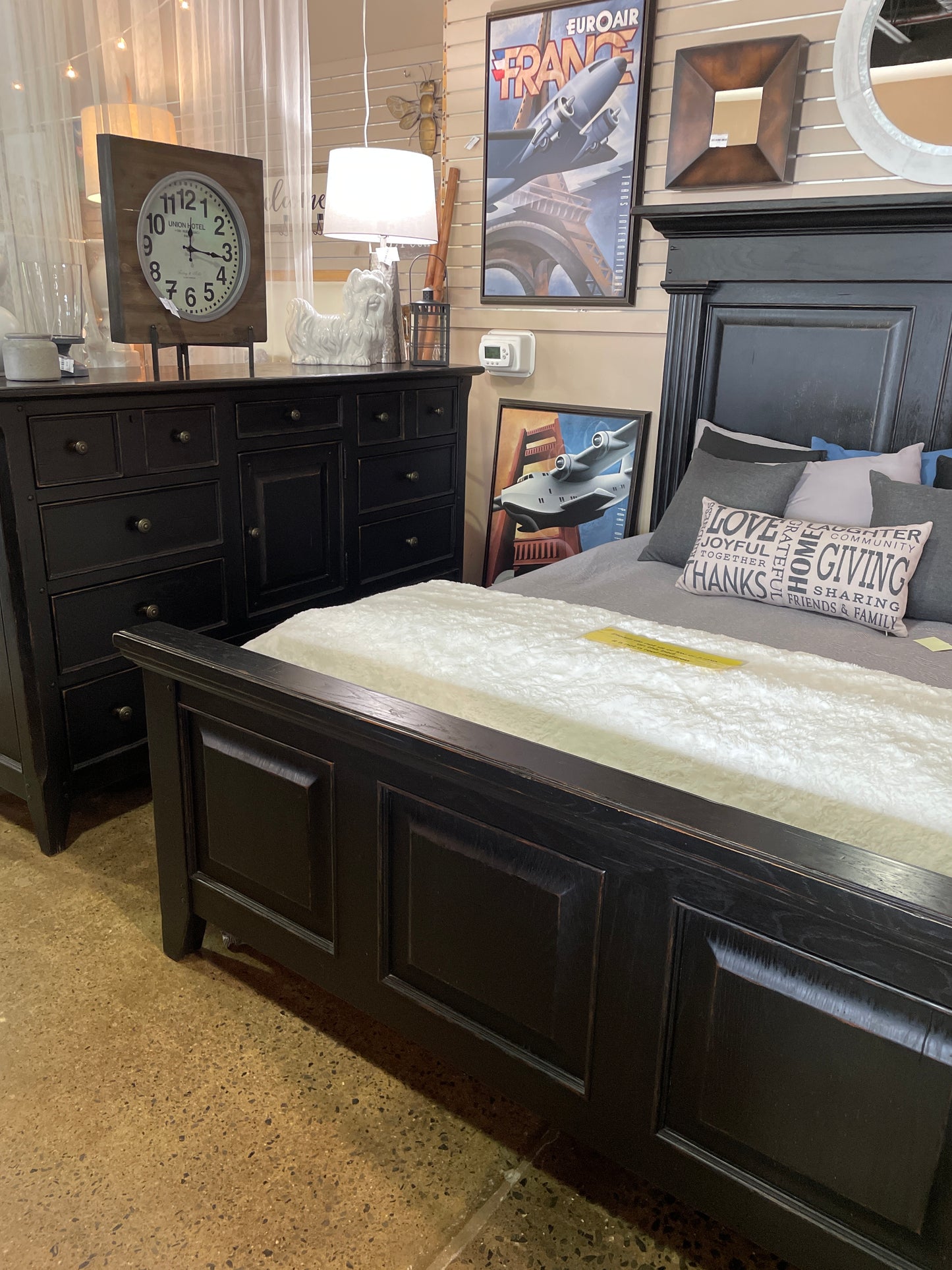 Black Queen bed frame with 9 drawer dresser