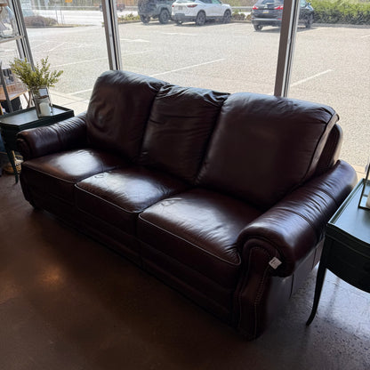 Brown leather reclining sofa