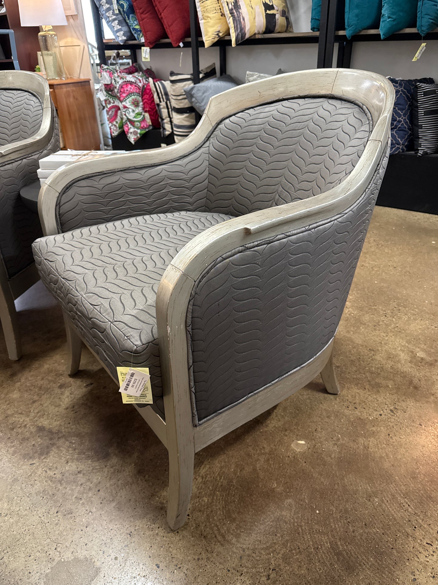 Taupe upholstered barrel chair