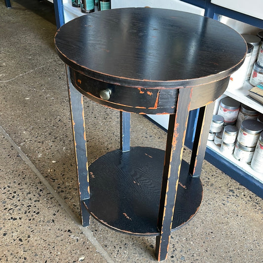 Black distressed end table