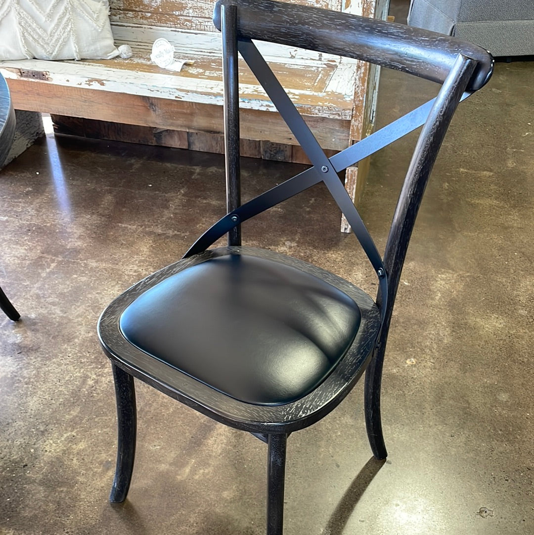 Black pedestal table with chairs