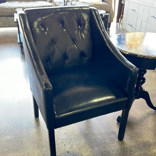 Pair black tuffed chairs