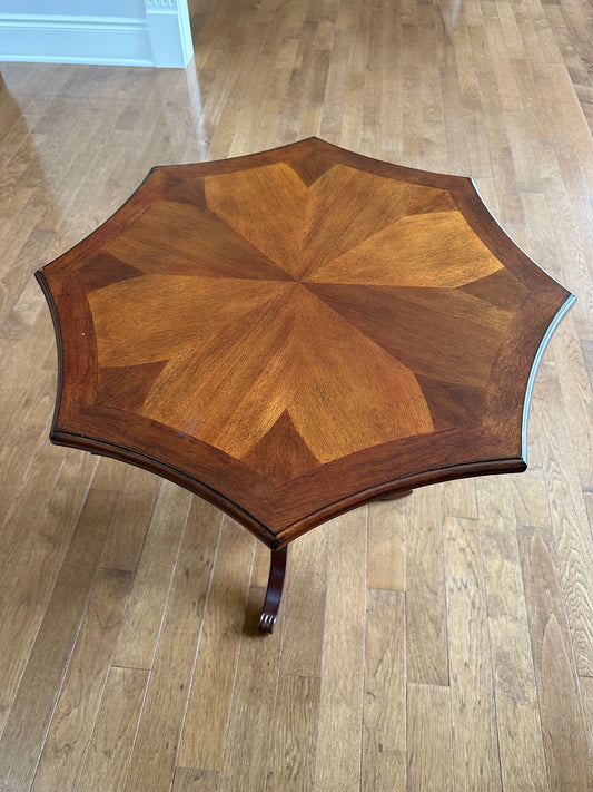 Wooden accent table with 8 point inlay top