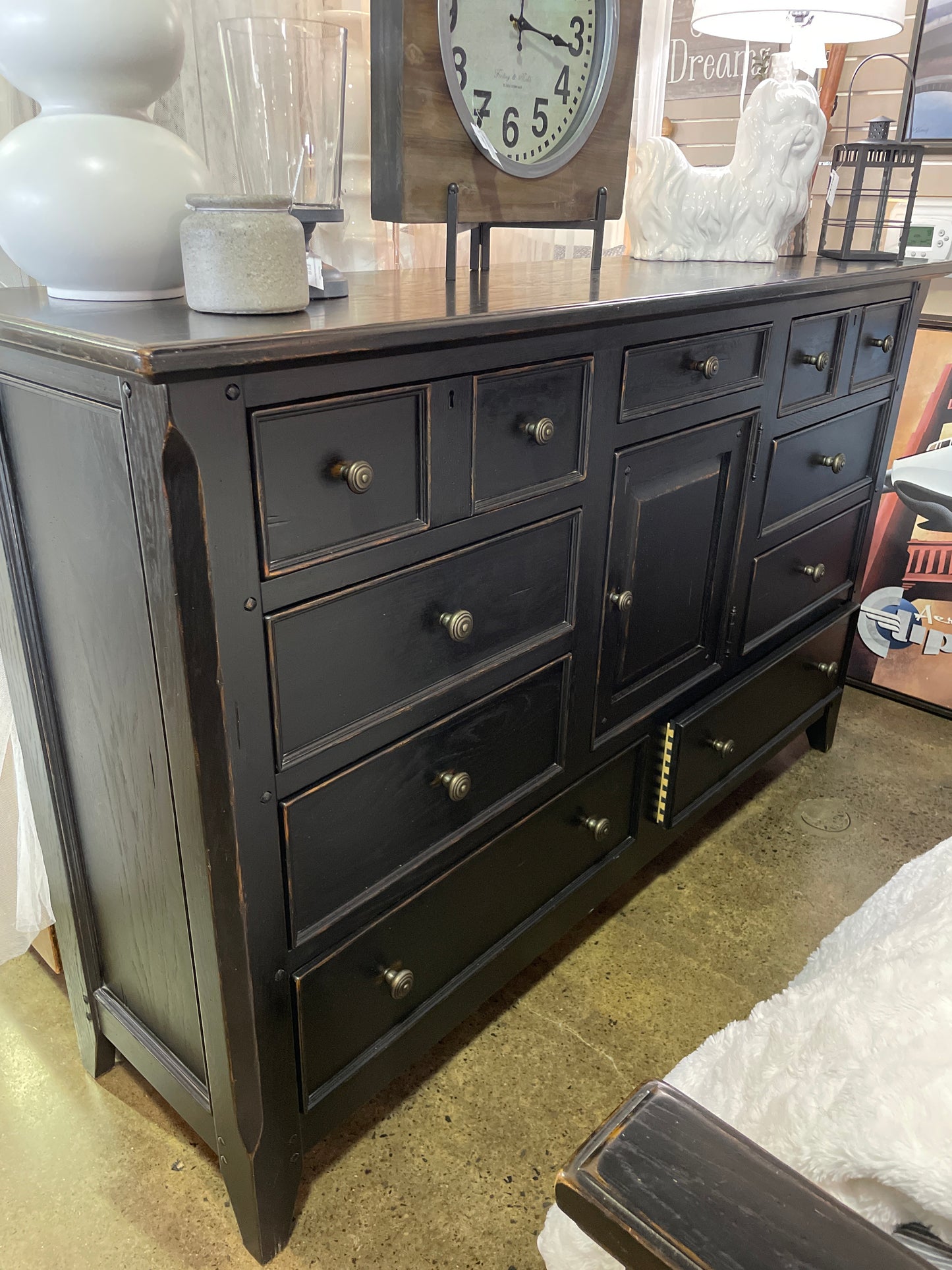 Black Queen bed frame with 9 drawer dresser