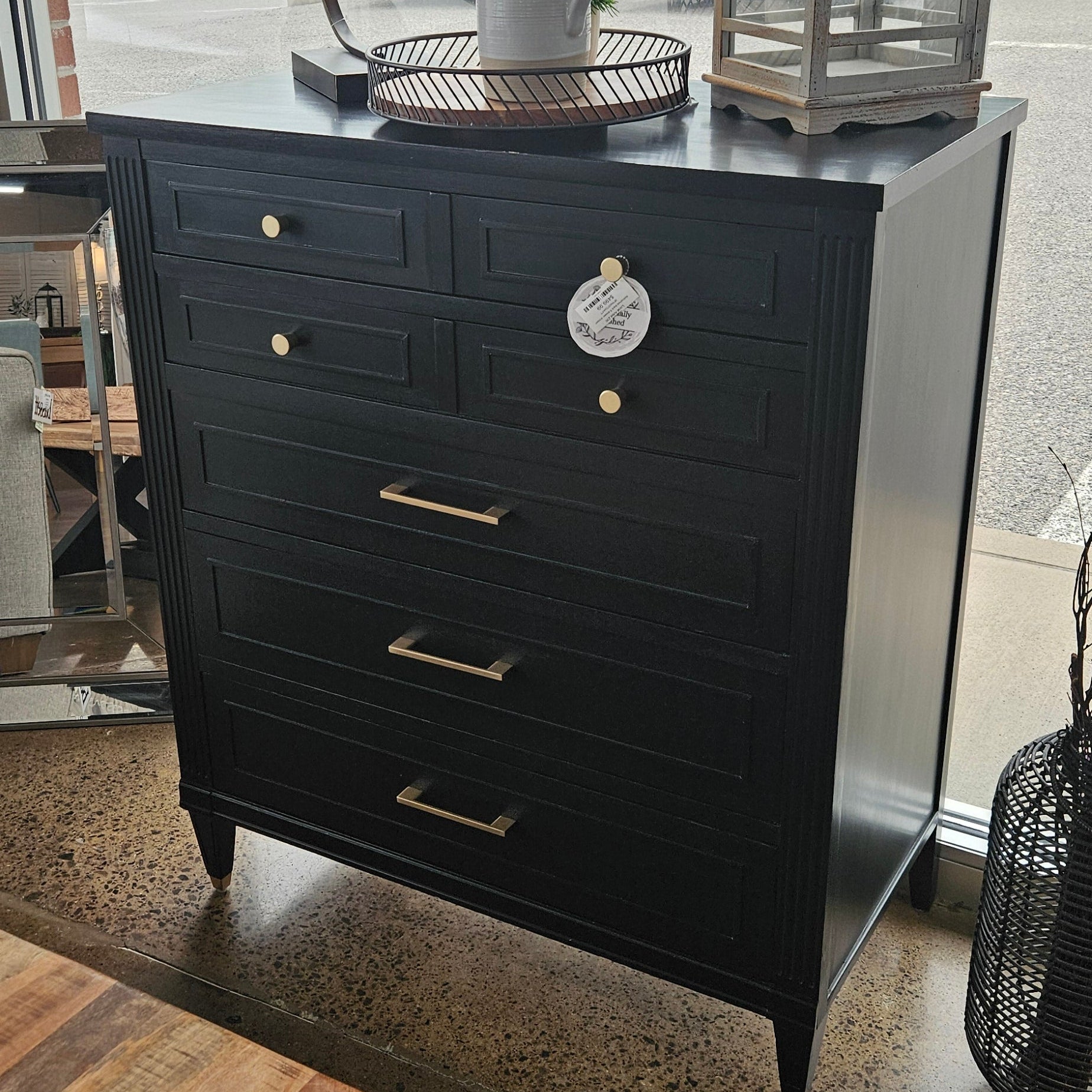Refinished black 5 drawer dresser in Zelienople PA at The Perfect Piece Store, a resale shop.