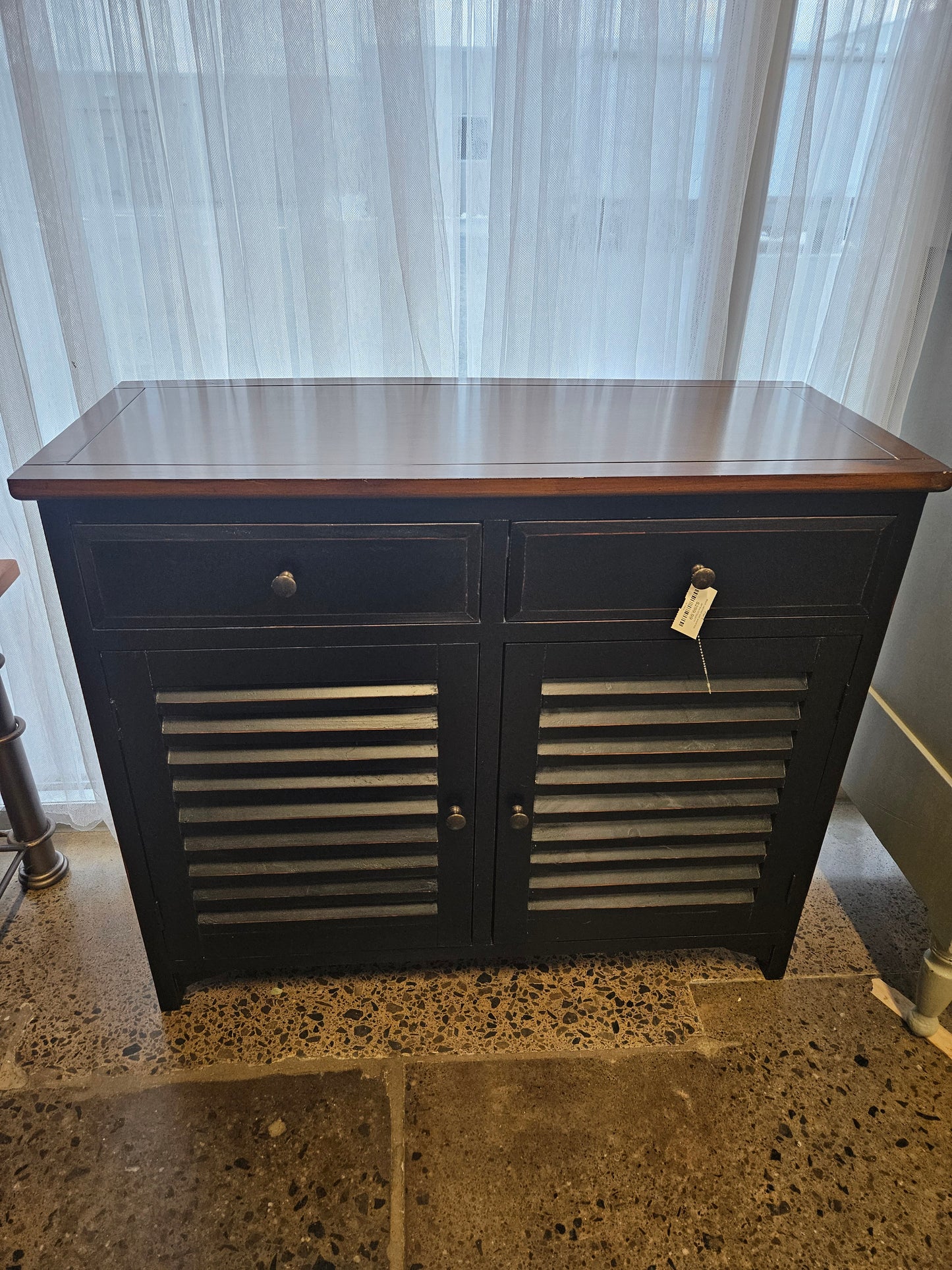Black cabinet with wood top