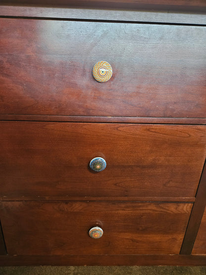 Kincaid 9 drawer dresser with colorful knobs