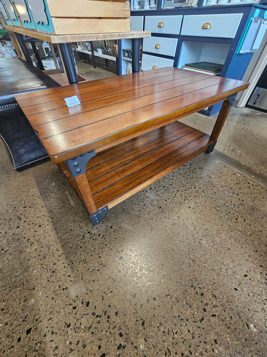 Plank coffee table with metal accents