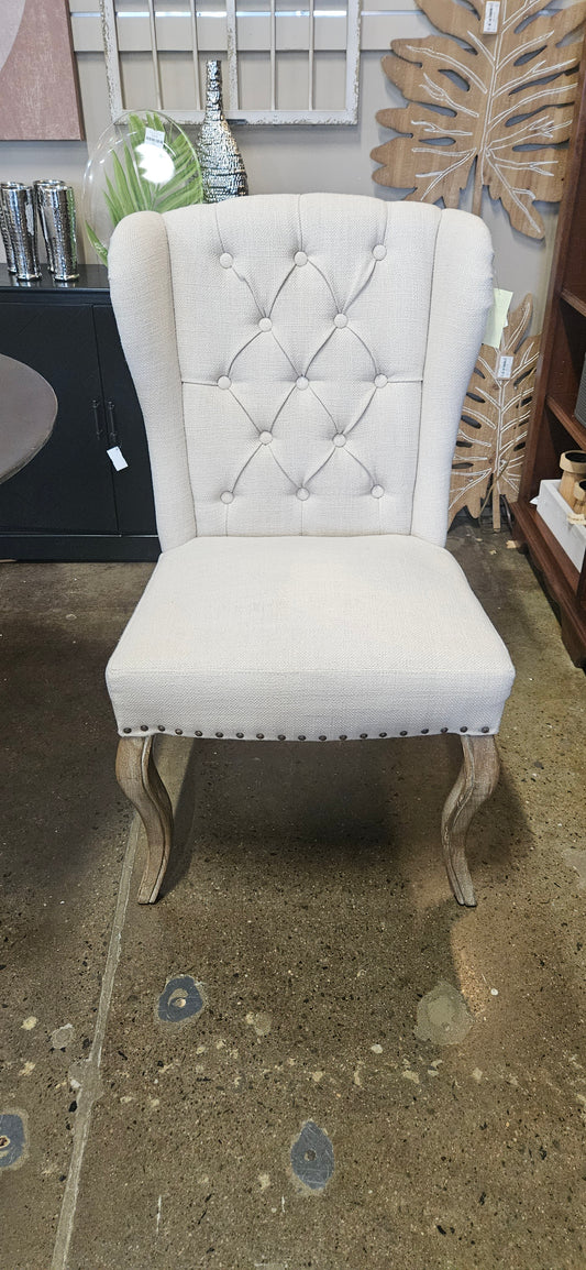 Pier 1 cream wingback tufted chair