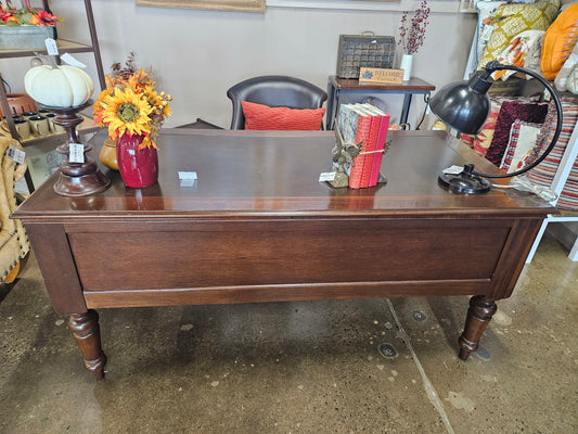 Dark wood leather topped executive desk