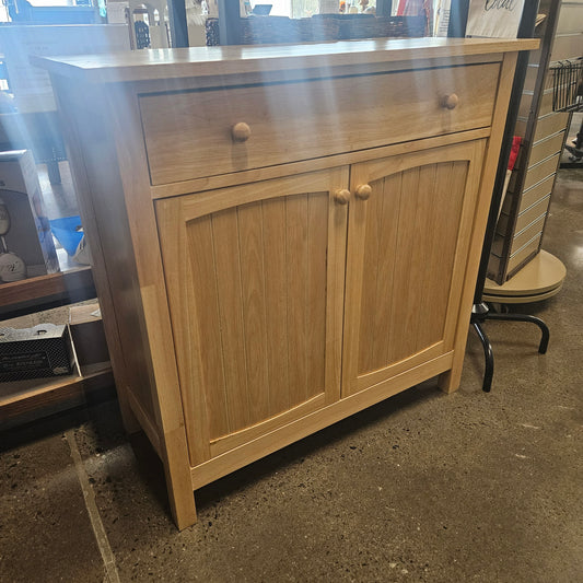 Light wood storage cabinet with single top drawer