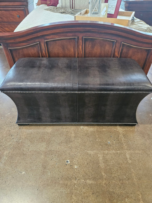 Brown patterned ottoman  with silver nailhead trim
