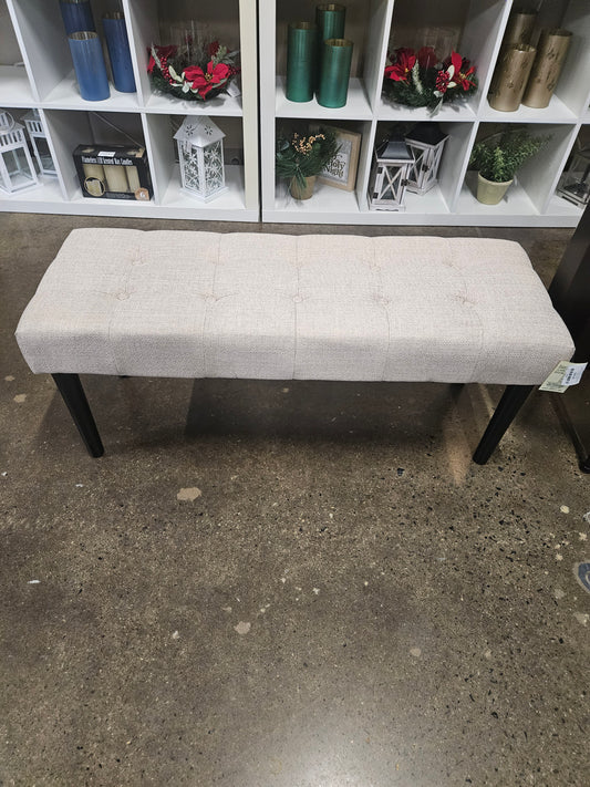 Neutral upholstered tufted bench
