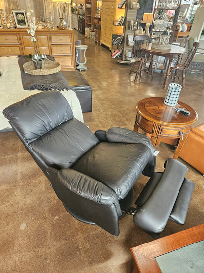 Dark blue/black leather push-back recliner