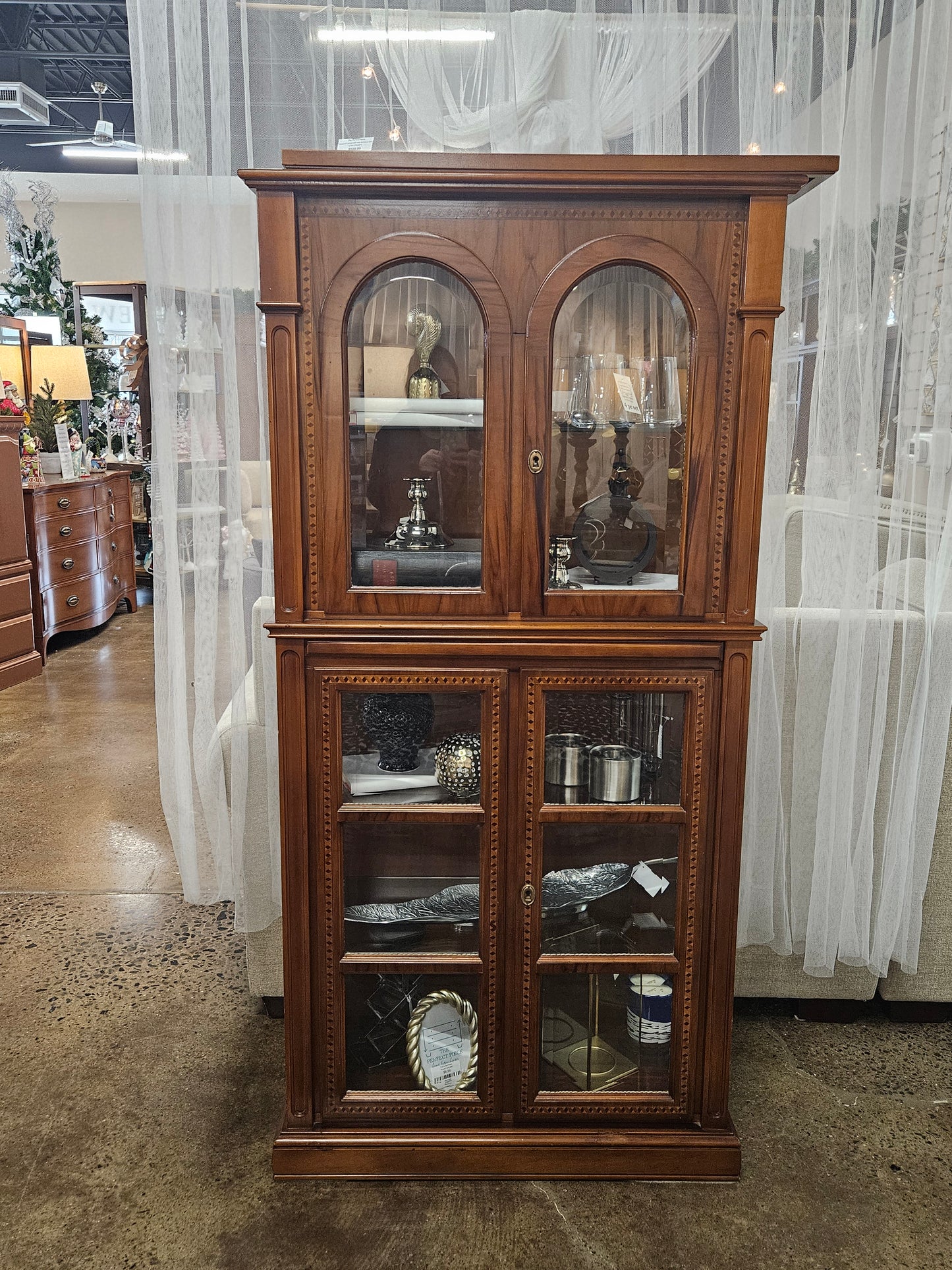 Carpanelli cabinet with inlay and glass shelves