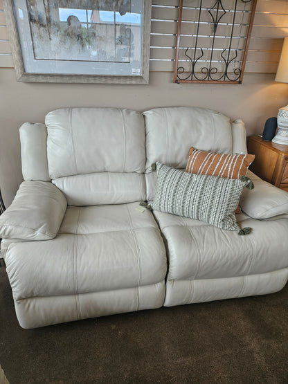 Cream Bonded Leather Reclining Loveseat